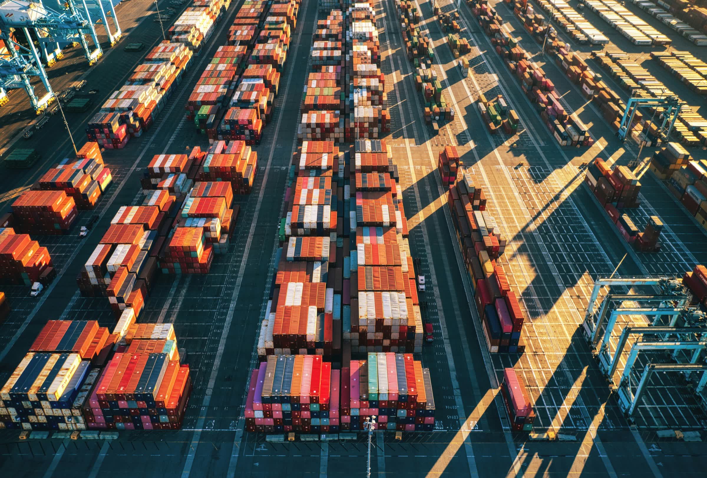 Aerial view of a container port at golden hour